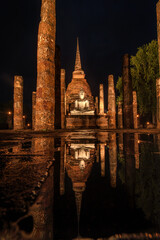 The scenery of Wat Sa Si temple with reflection at night in Sukhothai province, Thailand.