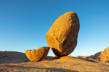 Eroded granite boulder in the Erongo mountains, Namibia, at sunrise © Chris