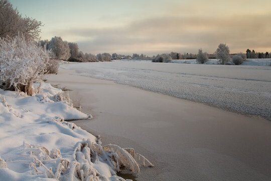 Freezing River In The Winter Sunset