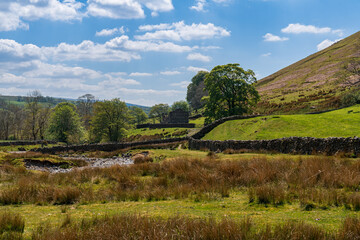 Fototapeta na wymiar Yorkshire Dales Landscape with the River Rawthey near Low Haygarth, Cumbria, England, UK