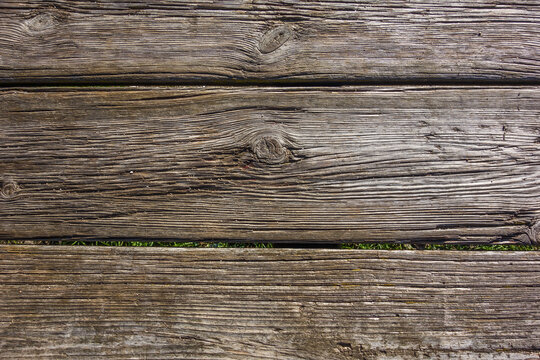 Detail of the texture of a wooden platform.