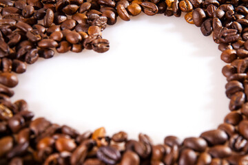 White heart love symbol in coffee beans