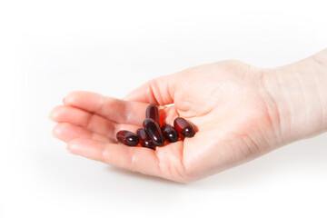 Young girl's holding pills. Protection from disease in beautiful hands