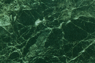 Texture of dark green marble for tabletop with pattern, macro background.