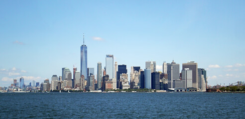 Fototapeta premium Manhattan skyline. Wall street view during a summer morning.