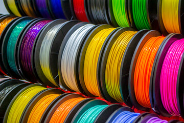 Multicolored filaments of plastic for printing on 3D printer close-up - obrazy, fototapety, plakaty