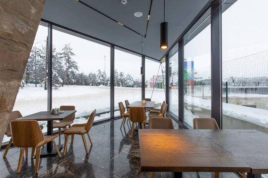 Interior of a modern mountain restaurant in the winter