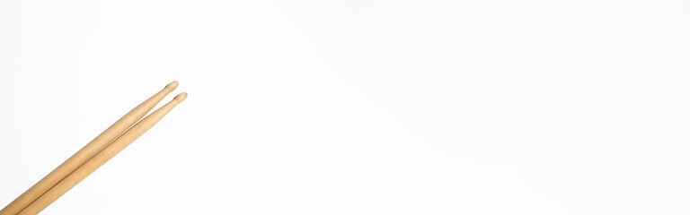 Banner drum sticks on white background, copy space