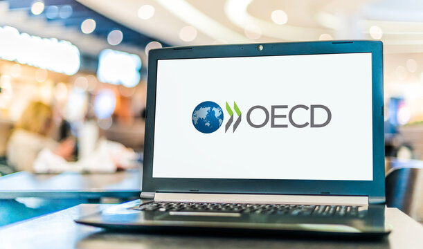 Laptop computer displaying logo of OECD