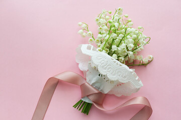 postcard layout. spring flowers. small bouquet of lilies of the valley and space for text © Palanga