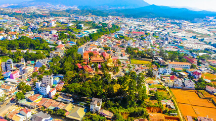 Fototapeta na wymiar Aerial view of The Golden Buddha statue or Thien vien Van Hanh in Dalat city in Vietnam.
