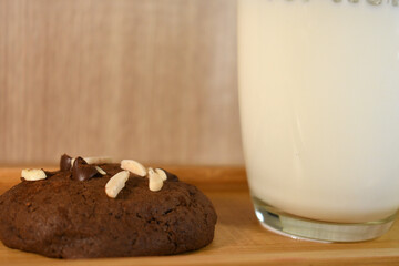 brownie double chocolate soft bake cookie with glass of white milk