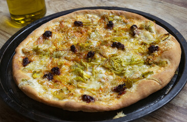 pizza with nduja and zucchini flowers