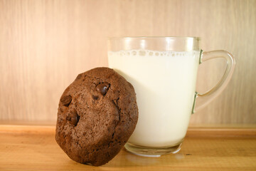 brownie double chocolate soft bake cookie with glass of white milk