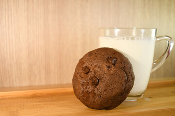 brownie double chocolate soft bake cookie with glass of white milk