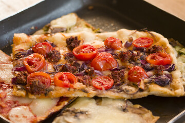 pizza nduja cherry tomatoes and onion