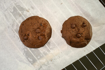 brownie double chocolate soft bake cookie on white wax sheet