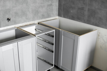 Lower custom kitchen cabinets installation with a furniture facades mdf. Gray modular kitchen from...