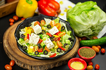 Greek salad top view dark theme