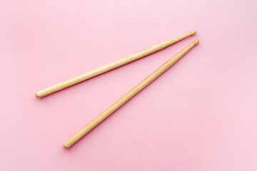 Two wooden drum sticks, top view. Music background