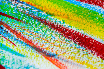 Many different multi-colored lines are chaotically drawn with brush