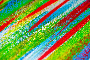 Many different multi-colored lines are chaotically drawn with brush
