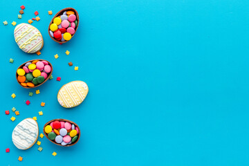 Easter chocolate eggs and sweets, top view