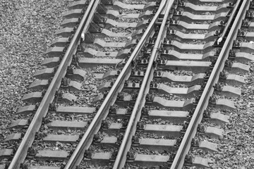 Railway. Rails. Sleepers. Industrial background.