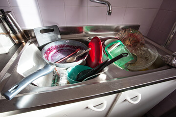 Crockery in the sink in the kitchen.