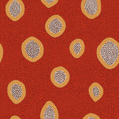 Seamless vector pattern including ethnic Australian motive with dotted ovals or rhombuses on dotted background