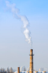 Ecology. Smoke from the chimney into the atmosphere. Pollution.