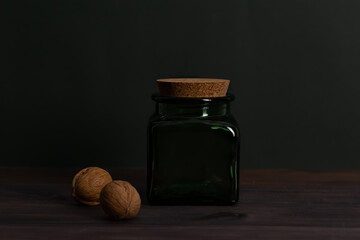 Glass storage jar and walnuts. Zero waste. Low key. Minimal