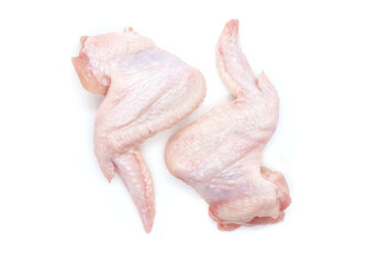 Raw Chicken wings isolated on white background. Two fresh chicken wings for cooking. Close-up. Top view.