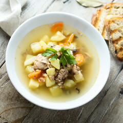 Traditional homemade fish soup with vegetables