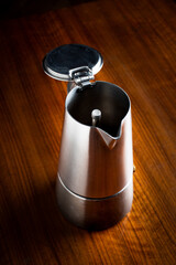 A steel coffee maker ready to work