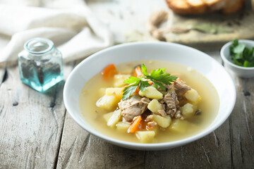 Traditional homemade fish soup with vegetables