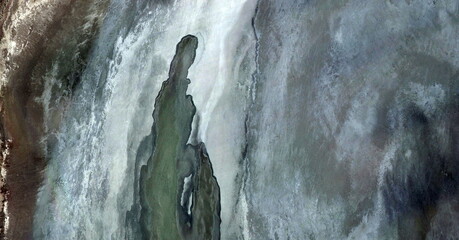 shadow at the waterfall,  United States, abstract photography of relief drawings in  fields in the...