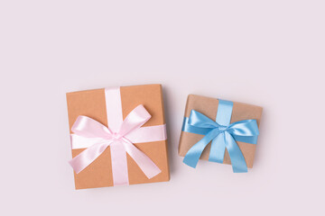 Gift boxes on a gray background. Present tied with ribbon. Congratulation concept with copyspace.