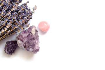 Beautiful amethyst crystals and round rose quartz stone with dry lavender bouquet. Magic amulets....