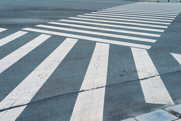 crossroad with white line sign