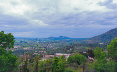 Fototapeta na wymiar The breathtaking landscapes of Italy. Panoramic view Gregorian villa surroundings against the background of an ensemble of clouds