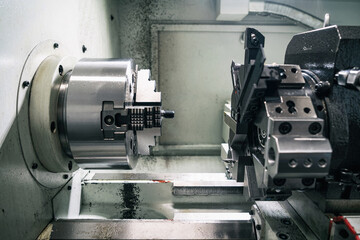 Cnc machine. The CNC lathe machine or Turning machine. Turning numerical control machine with tools and chuck fot automotive.