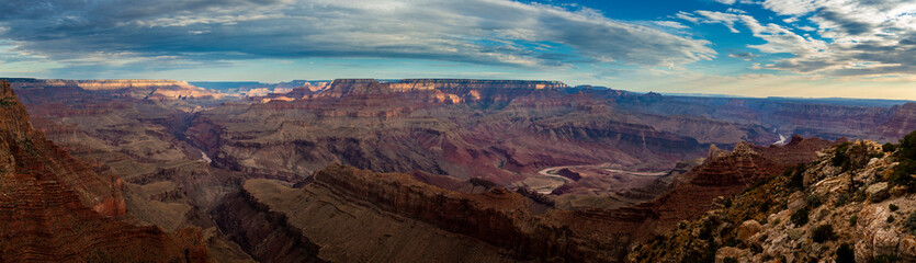 Fototapeta na wymiar Scenic panoramic view of the Grand Canyon and the Colorado River from the Desert View viewpoint, in the Grand Canyon National Park, at sunrise, in the State of Arizona, USA