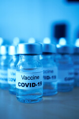 canisters with covid-19 vaccines
