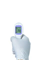 A hand wearing white gloves holds an infrared thermometer on a white back.