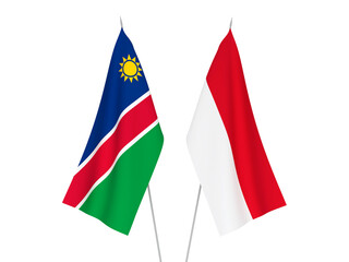 National fabric flags of Republic of Namibia and Indonesia isolated on white background. 3d rendering illustration.