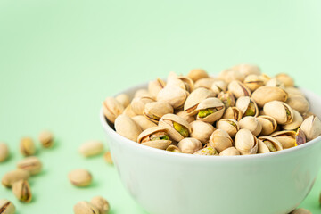 toasted pistachios in a bowl. Nuts vegan protein