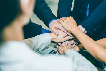 Businessman group of people hand shake after the new project meeting as strength unity teamwork. Business agreement, merger and acquisitions concept.