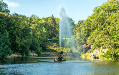 Lakes and fountains of the famous Sofievsky arboretum and walking people, in the city of Uman, Ukraine