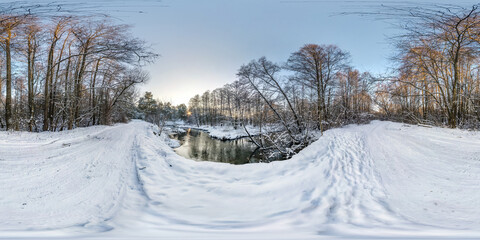 Winter full spherical seamless hdri panorama 360 degrees angle view on road in a snowy park near small river in equirectangular projection. VR AR content